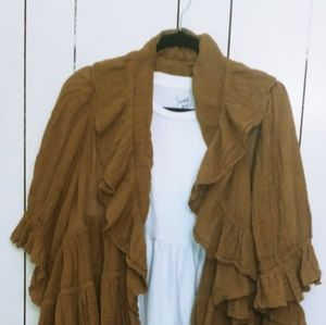 Beautiful goldfish brown ruffled jacket.